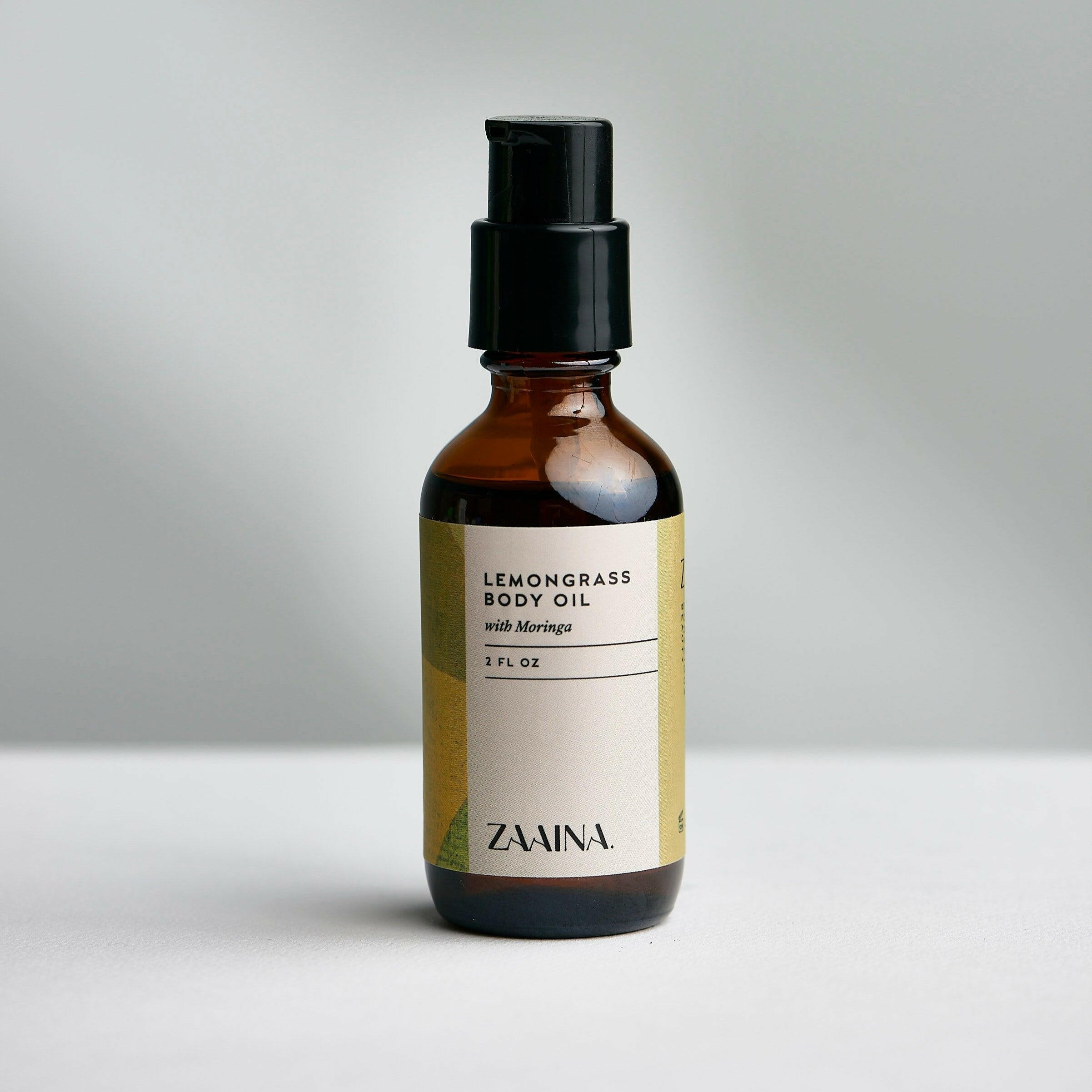Lemongrass body oil in a glass bottle, nourishing natural skincare product with refreshing citrus scent