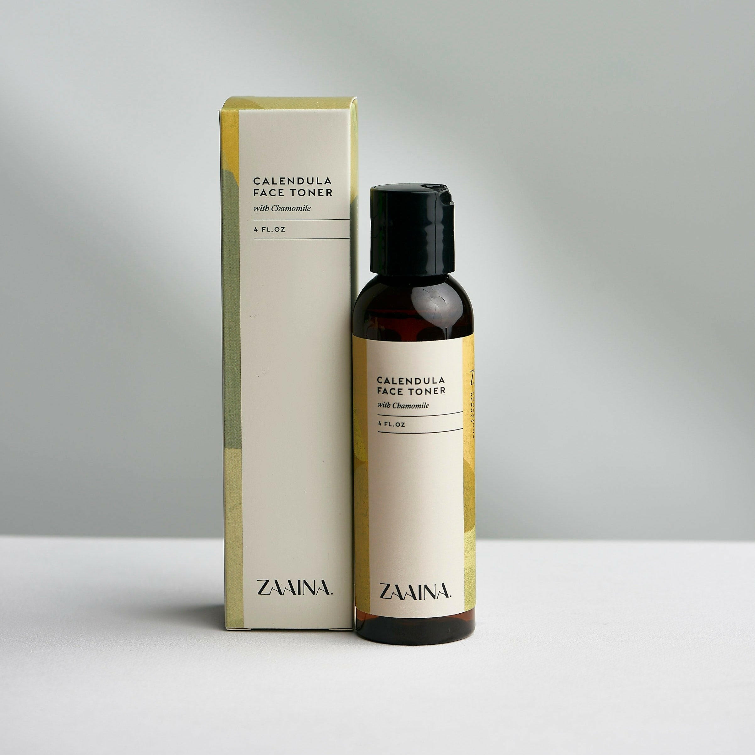 Chamomile facial toner bottle on a white background, gentle skincare product for soothing and refreshing your skin.