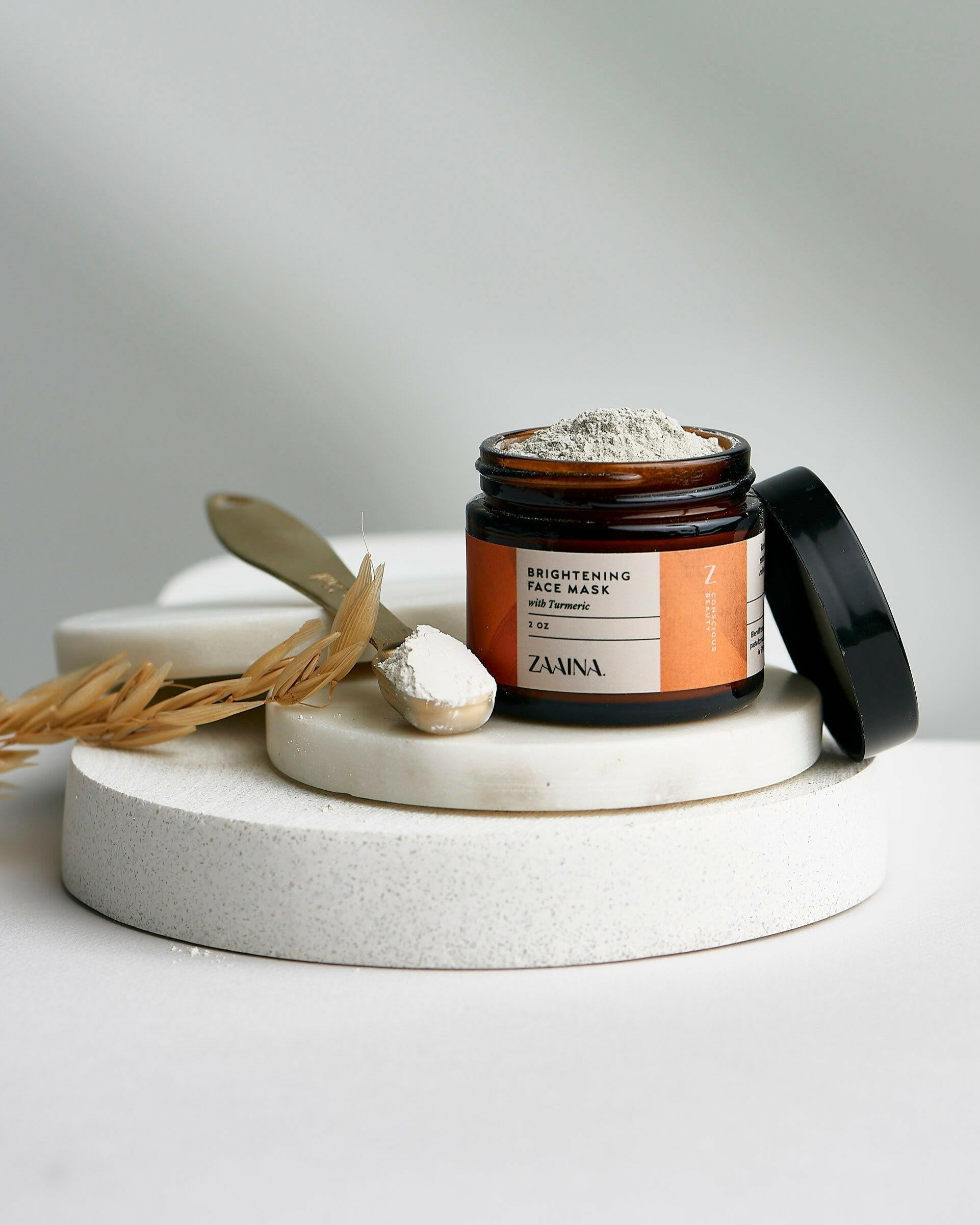 Radiant skin using turmeric and clay face mask for natural detox and deep pore cleansing benefits.