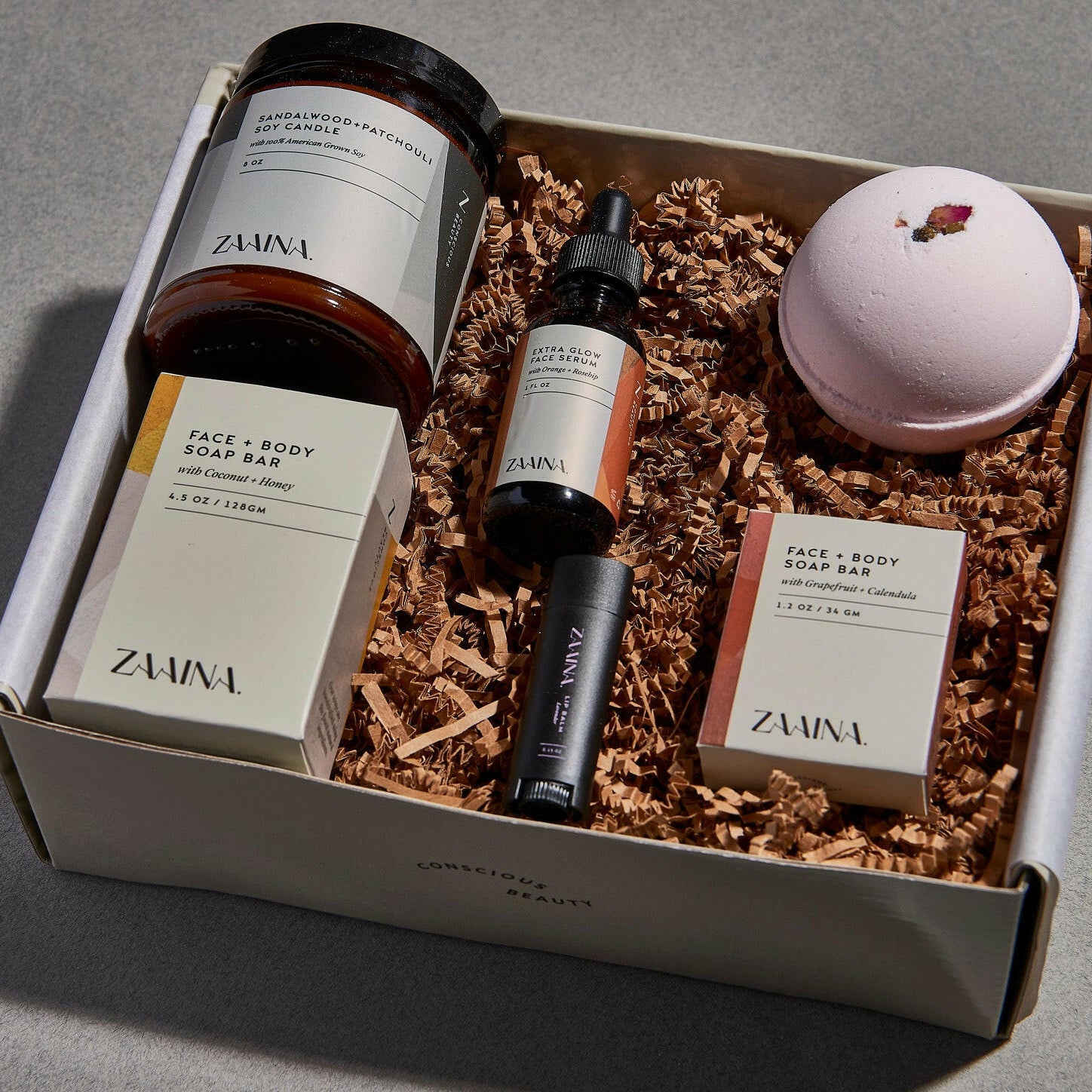 Luxury spa box featuring rose and sandalwood essentials for relaxation, perfect gift set for wellness enthusiasts.