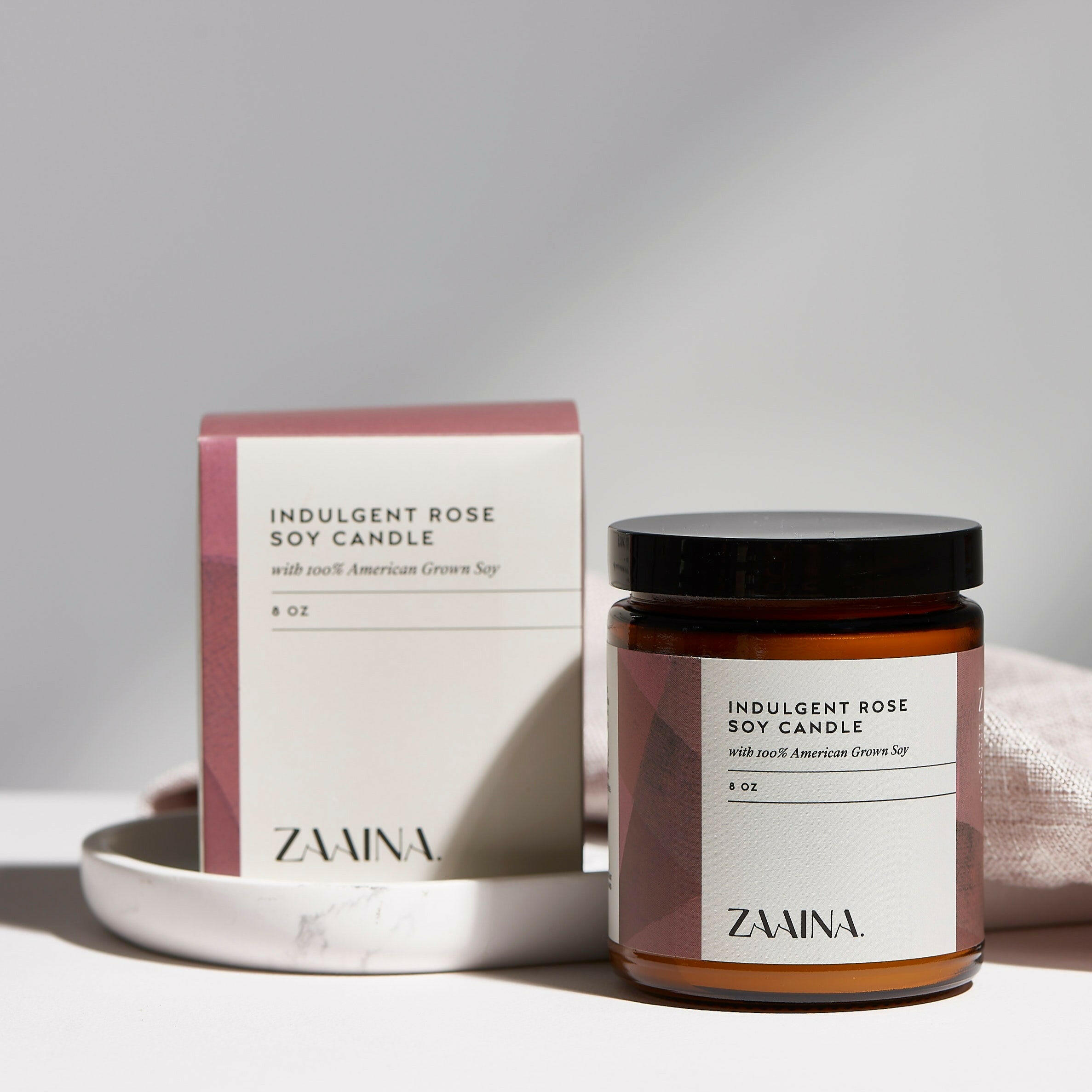 Elegant Rose Soy Candle in a glass jar, perfect for home aromatherapy and eco-friendly relaxation.